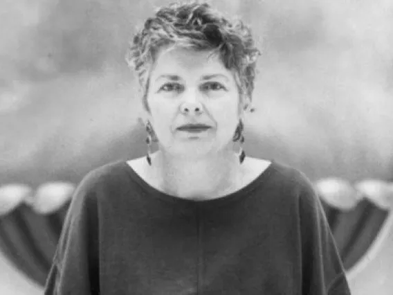 photo of Minnie Bruce Pratt in black and white with short wavy hair and a flowing shirt